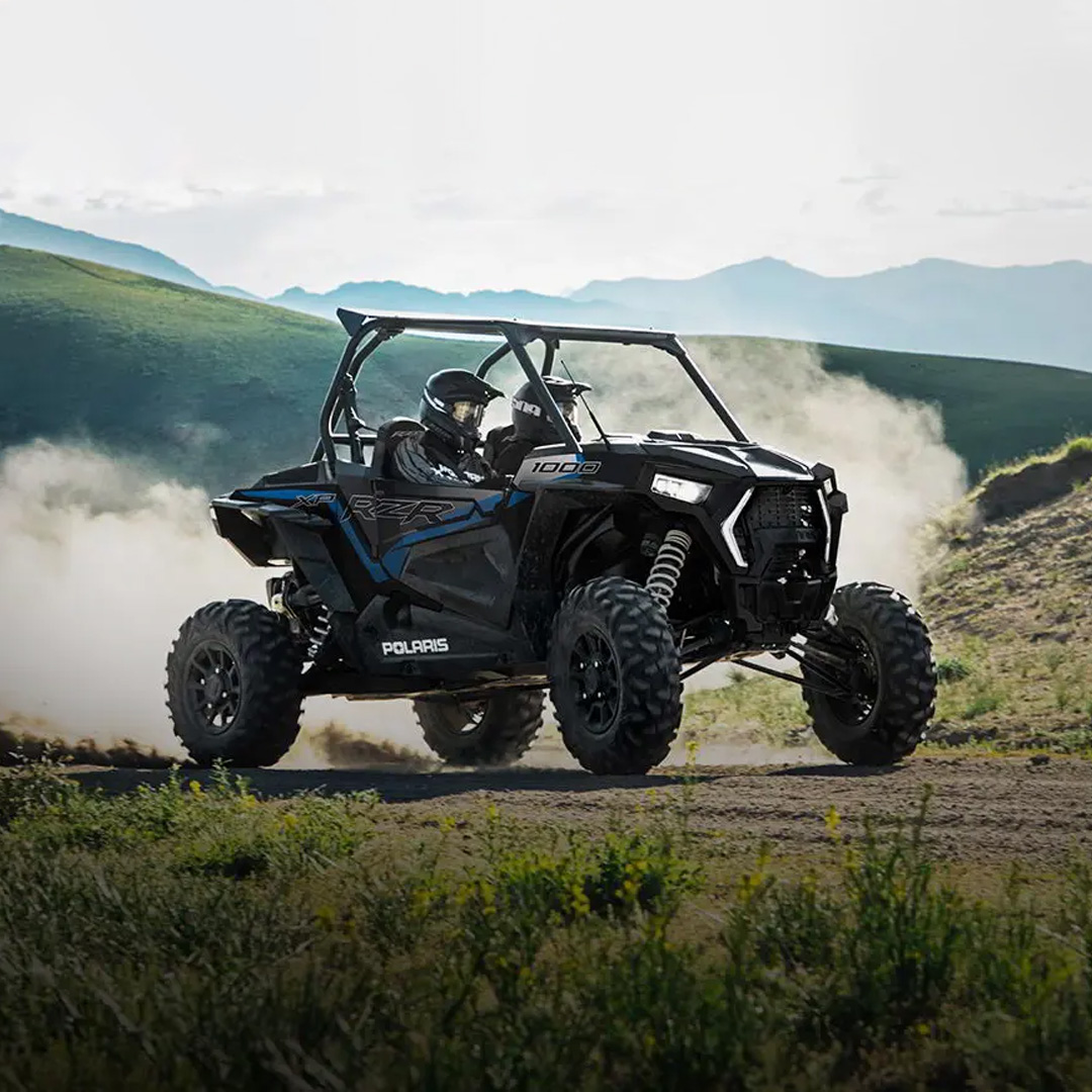 2023 Polaris RZR Driving through a Valley